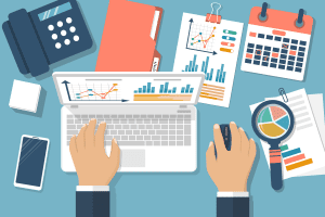 A computer, phone, folder, graphs, calendar, and notes