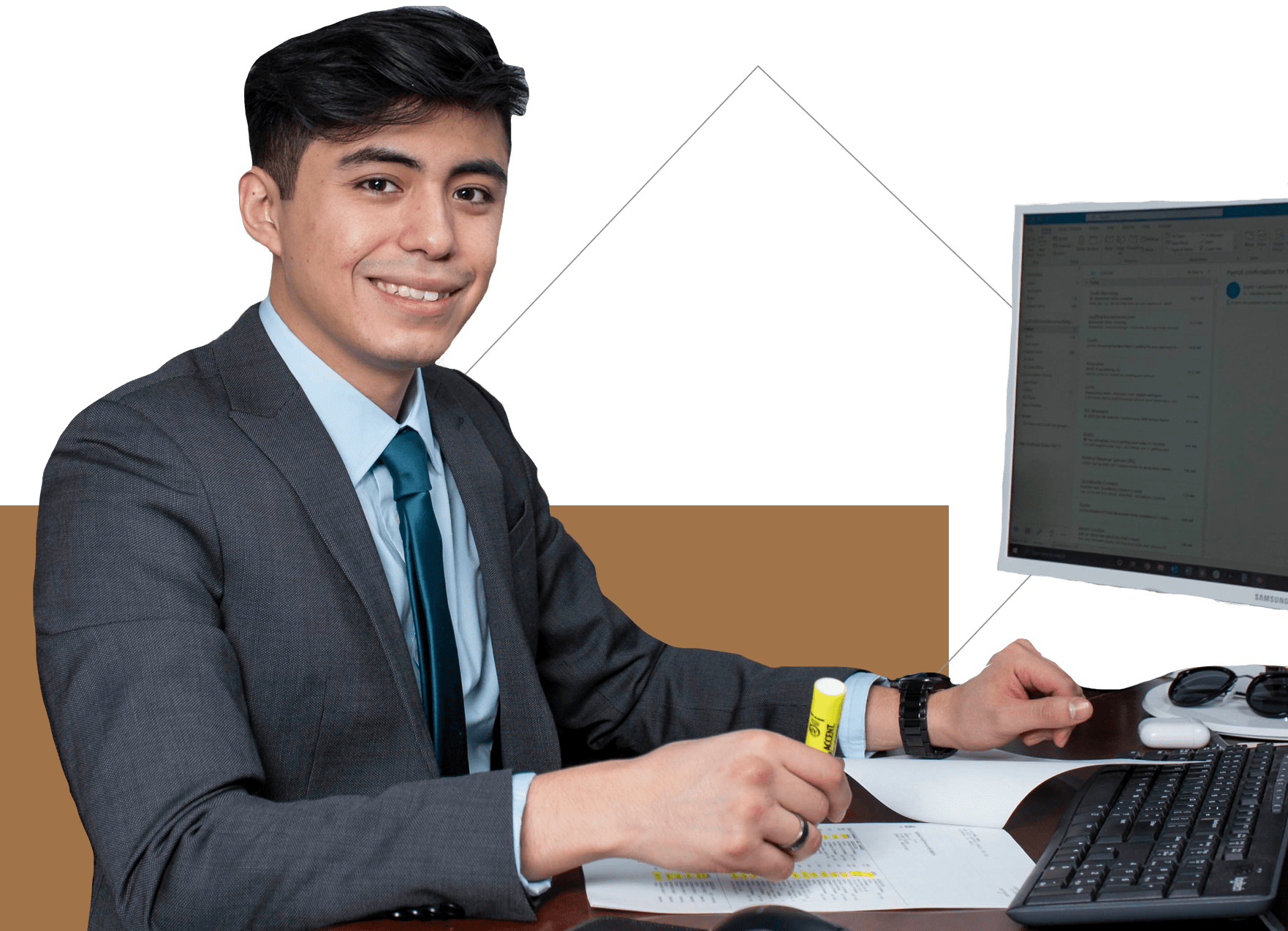 a professional at his desk with a computer