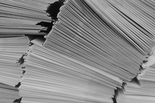 stacked pieces of mail